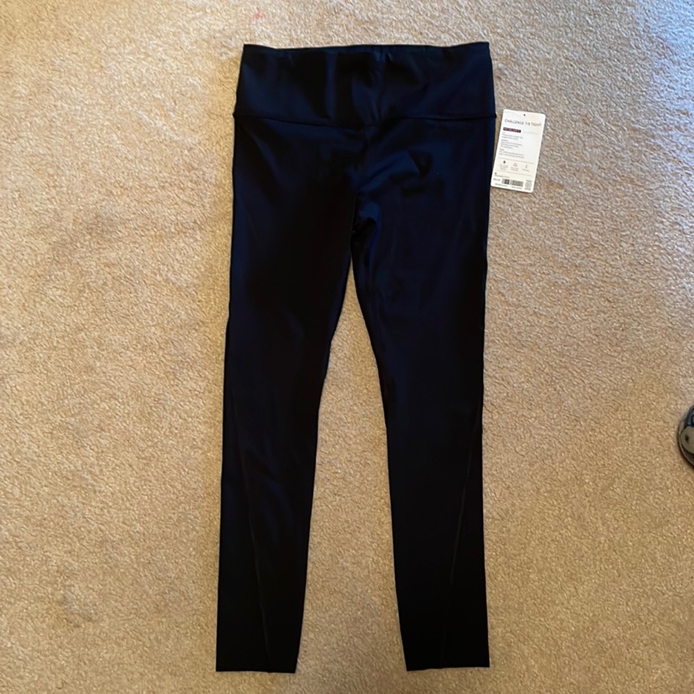 Athleta challenge 7/8 tights. Never worn. New with tags